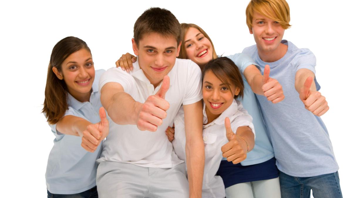 Teenagers giving thumbs up